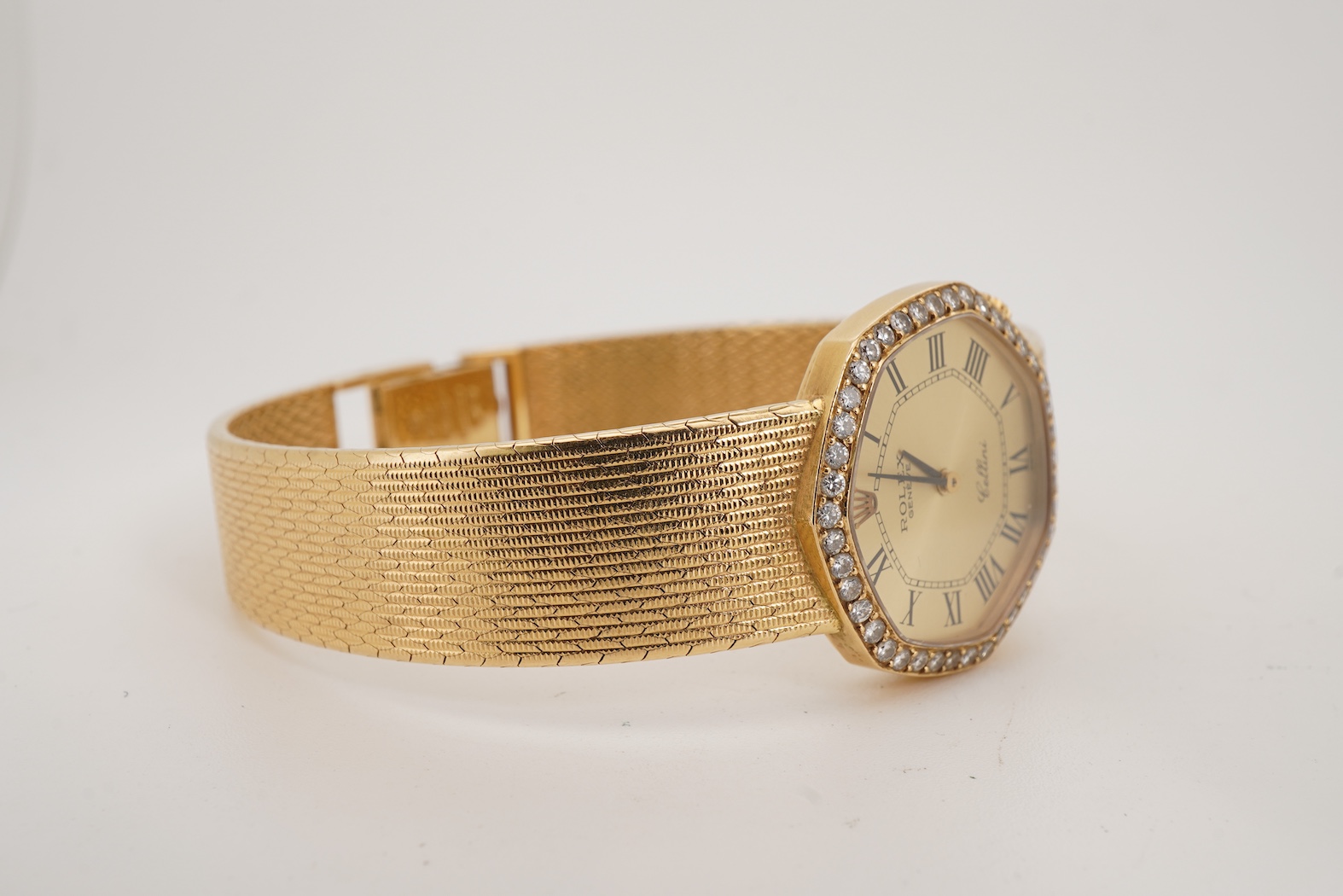 A lady's late 20th century 18ct gold and diamond Rolex Cellini manual wind dress wrist watch